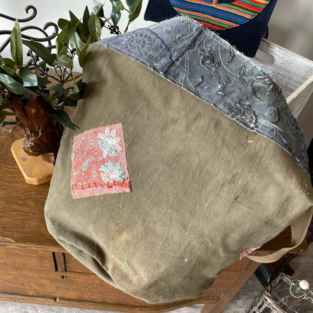 Crossbody purses made out of recycled army tents.